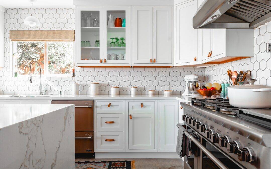 White kitchen with silver gas oven