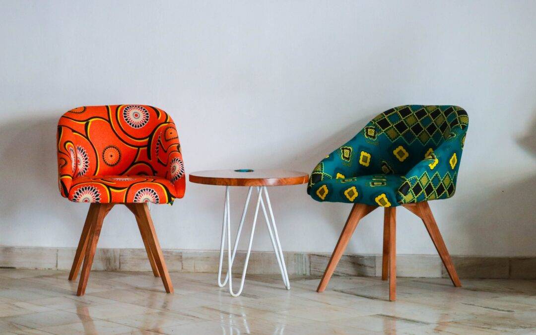 Two colorful chairs and small table